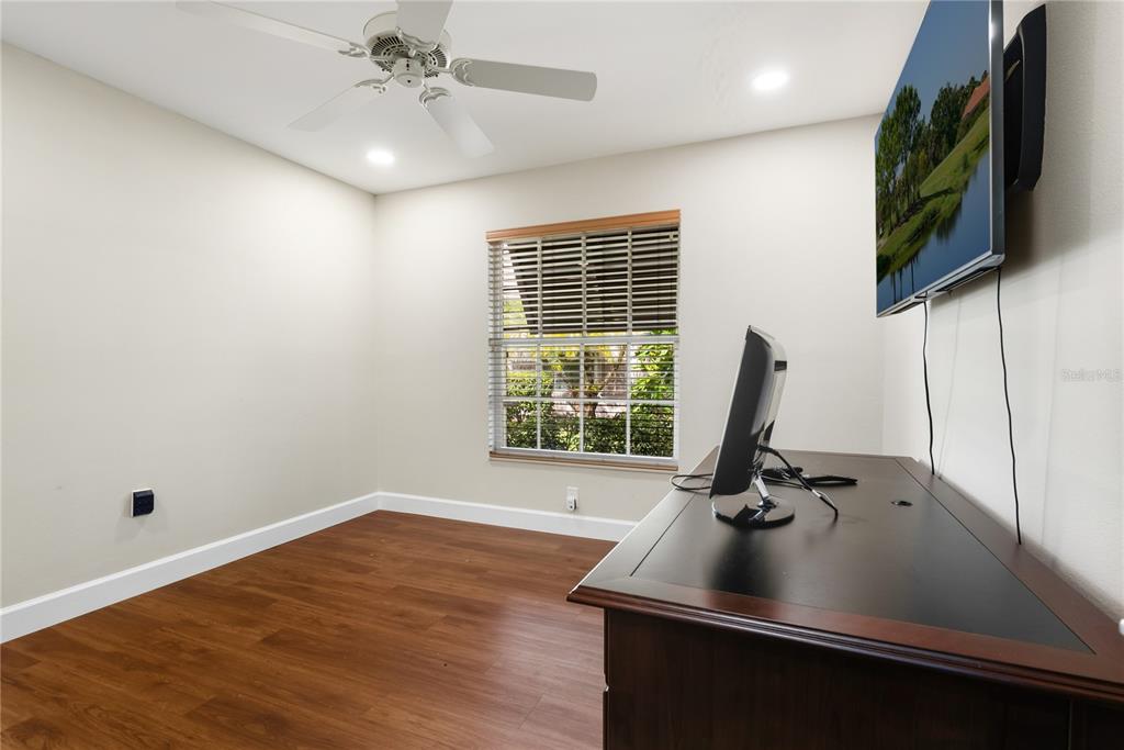 4016 Oakley Greene, Unit 40 Sarasota, FL 34235 - Photo 26 of 51 a view of a room with gym equipment