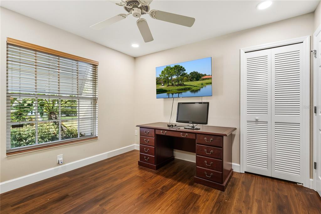 4016 Oakley Greene, Unit 40 Sarasota, FL 34235 - Photo 27 of 51 a view of a workspace with furniture and a window