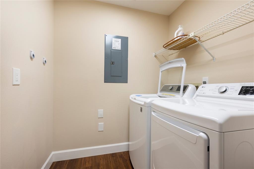 4016 Oakley Greene, Unit 40 Sarasota, FL 34235 - Photo 28 of 51 a utility room with dryer and washer