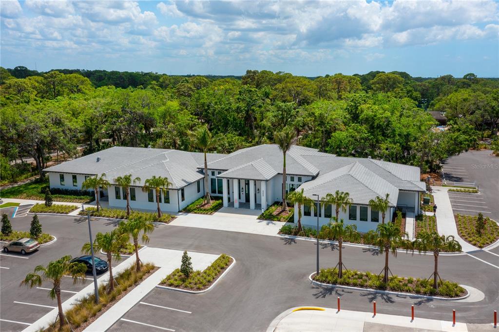 4016 Oakley Greene, Unit 40 Sarasota, FL 34235 - Photo 45 of 51 an aerial view of a house with swimming pool and outdoor seating