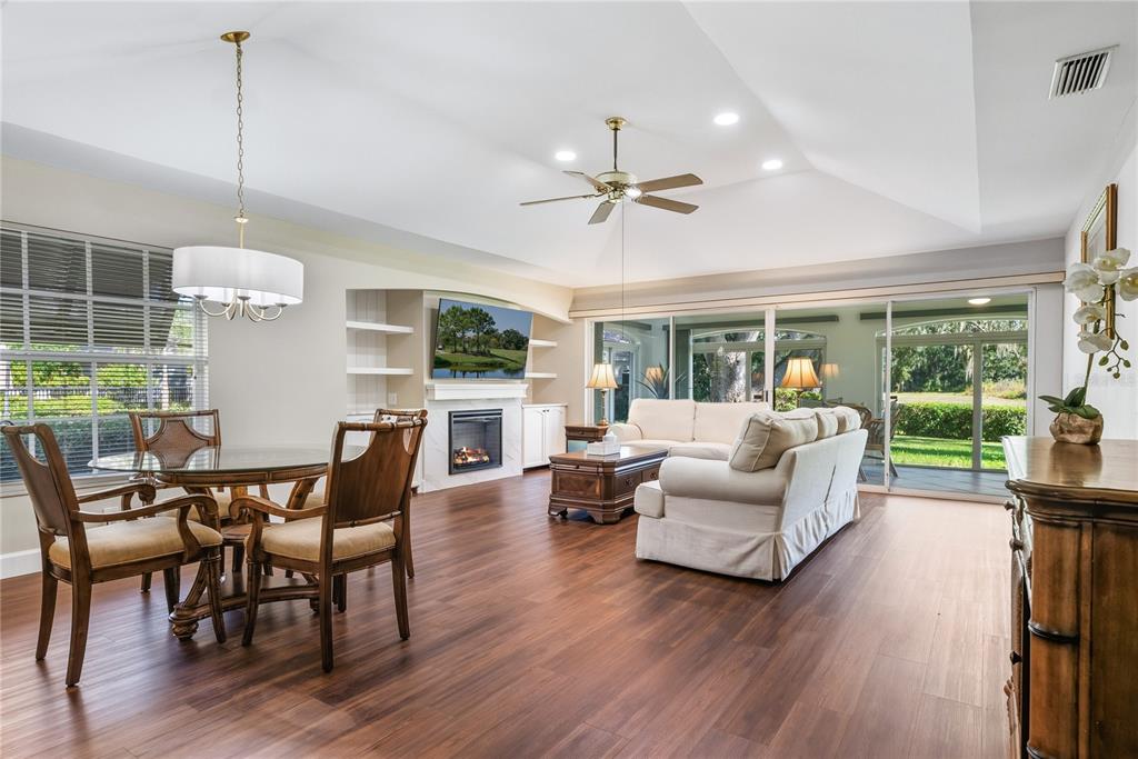 4016 Oakley Greene, Unit 40 Sarasota, FL 34235 - Photo 8 of 51 a view of a livingroom with furniture window and wooden floor