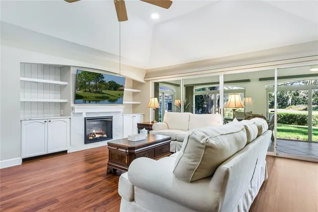 a kitchen with stainless steel appliances granite countertop a refrigerator stove a sink dishwasher and microwave