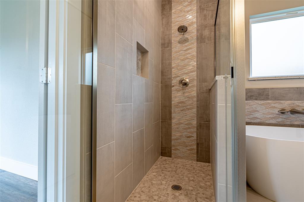 2044 Salina Circle Granbury, TX 76048 - Photo 22 of 38 a bathroom with a shower and a sink