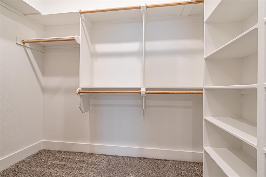 2044 Salina Circle Granbury, TX 76048 - Photo 23 of 38 a view of an empty walk in closet
