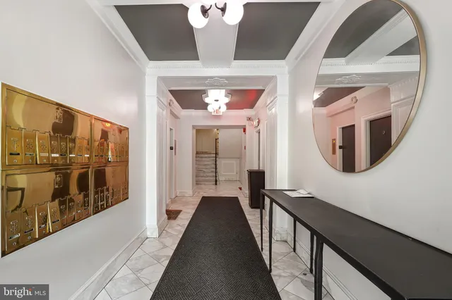 a view of a hallway with windows