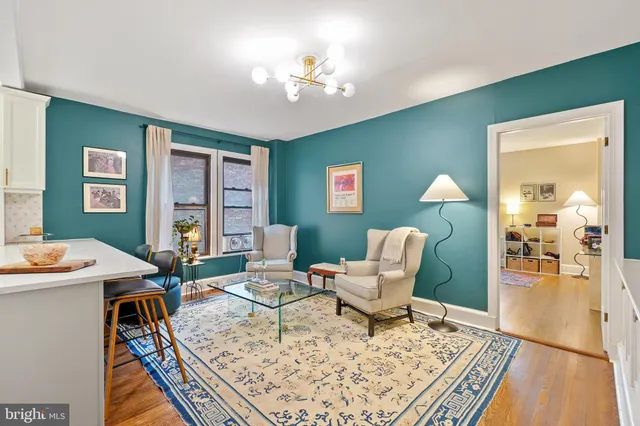 a workspace with furniture and window