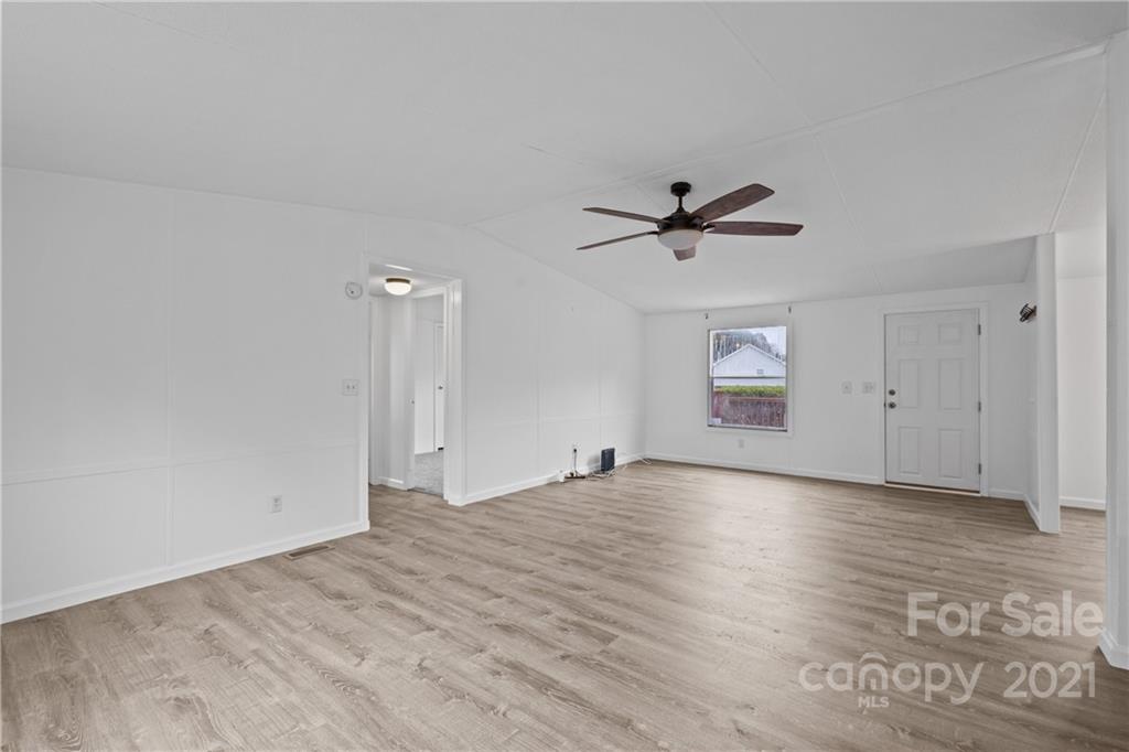 175 Reading Road Salisbury, NC 28147 - Photo 13 of 38 an empty room with fan and windows