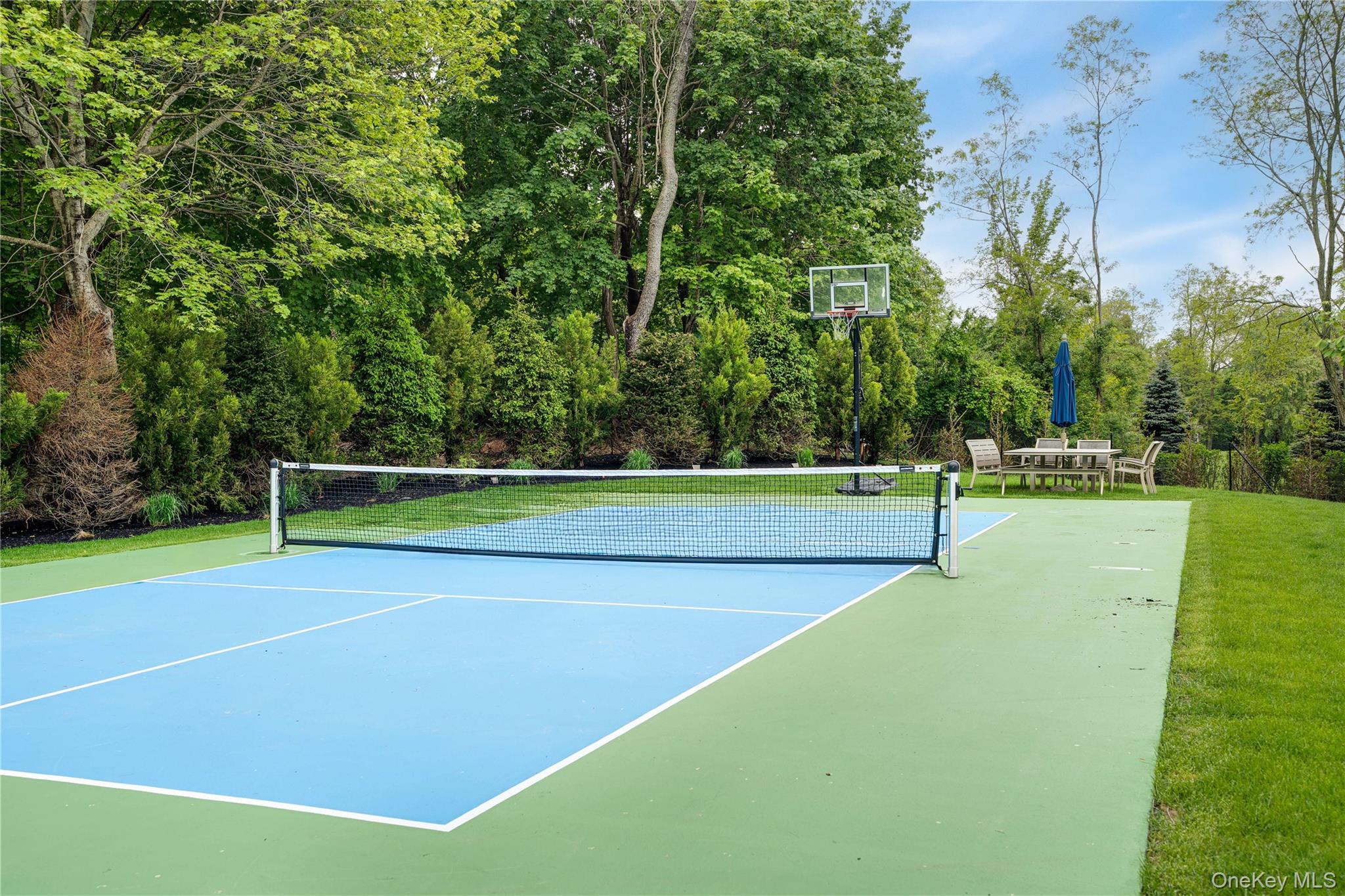100 South Ferry Road Shelter Island, NY 11964 - Photo 27 of 28 a view of a tennis court
