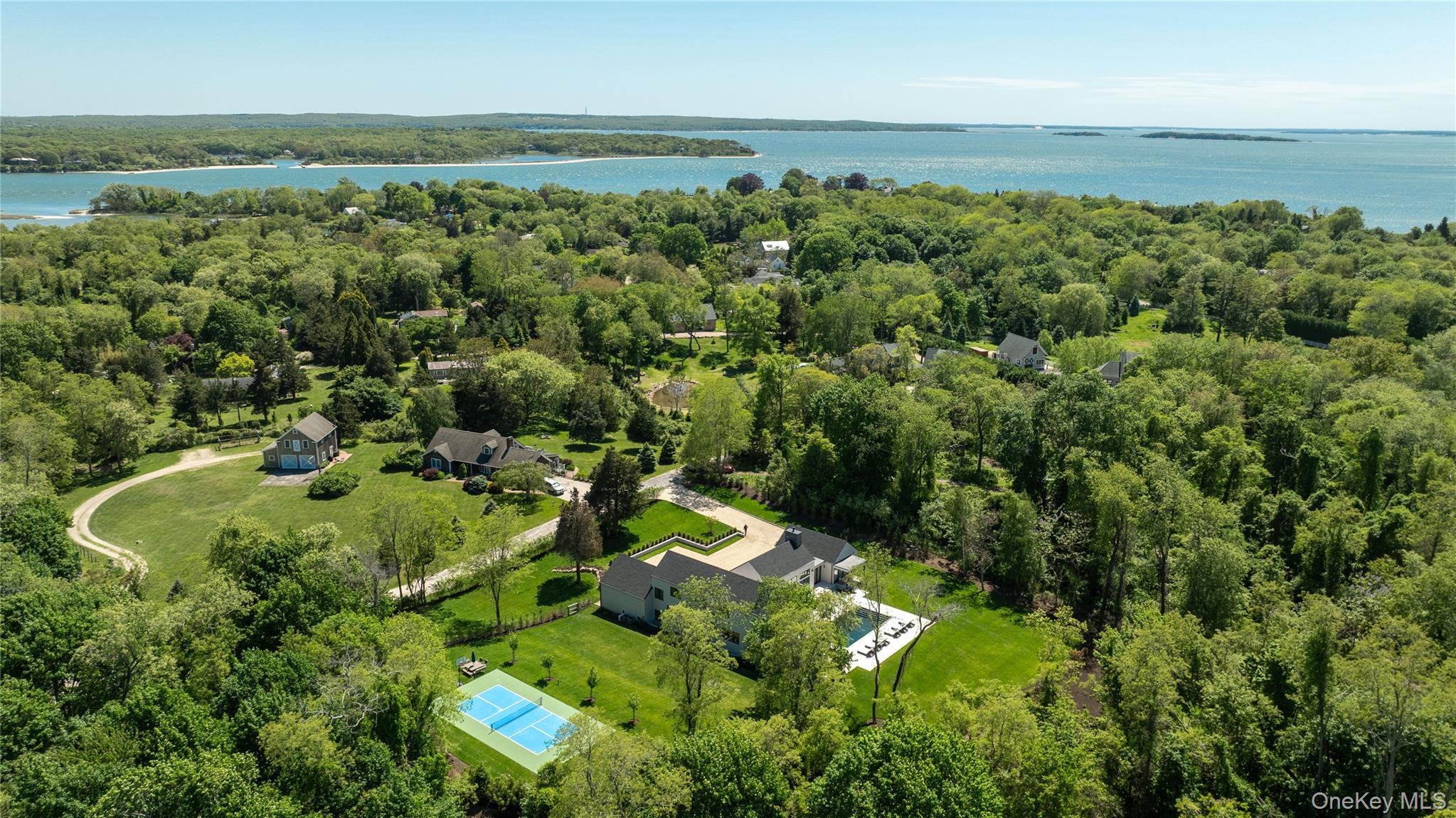 100 South Ferry Road Shelter Island, NY 11964 - Photo 6 of 28 an aerial view of a houses with a yard