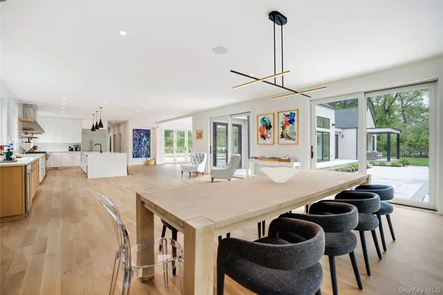 a view of a dining room with furniture window and outside view