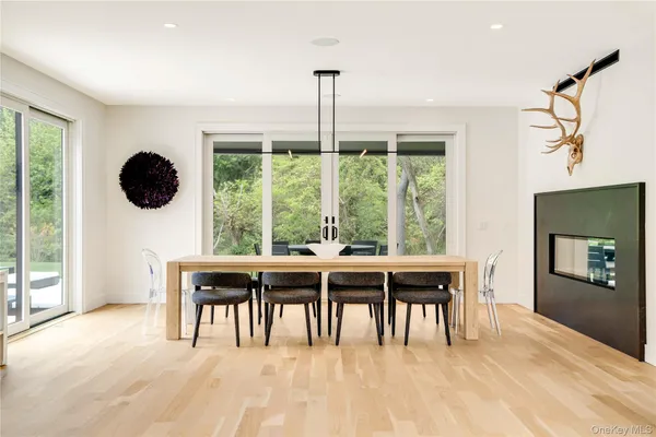 a dining room with furniture and window