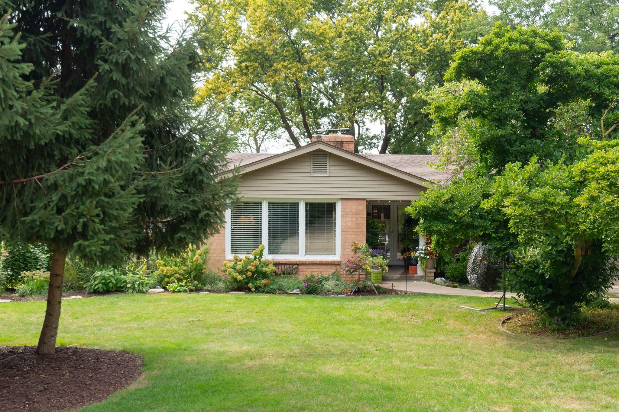 4743 Welsh Road Rockford, IL 61107 - Photo 1 of 52 a front view of house with a garden
