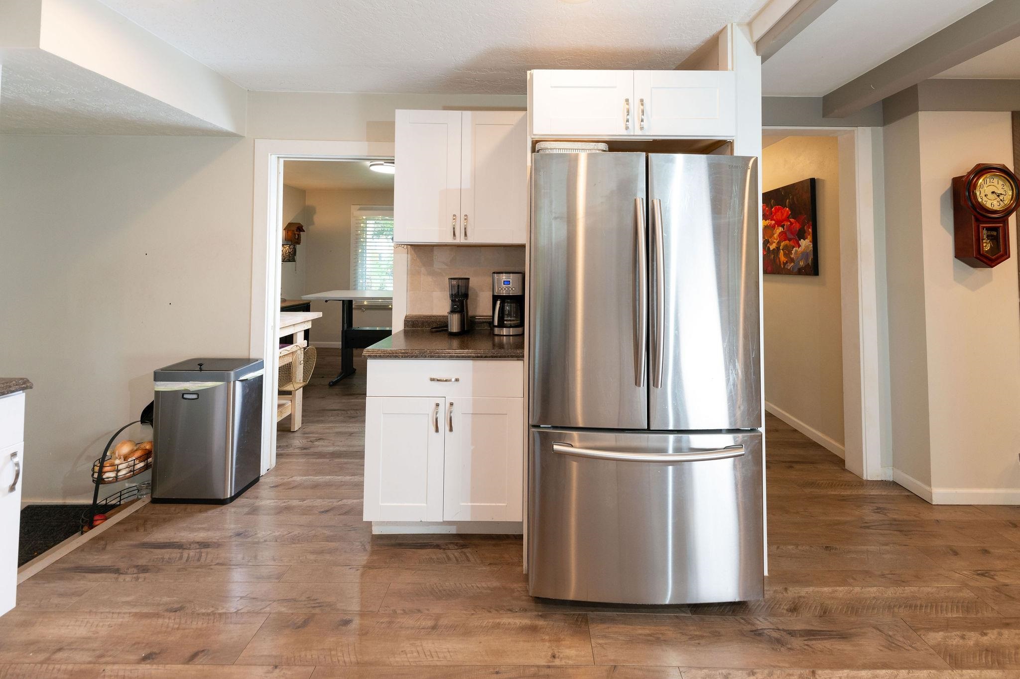 4743 Welsh Road Rockford, IL 61107 - Photo 21 of 52 a kitchen with stainless steel appliances a refrigerator a sink a stove a microwave and cabinets