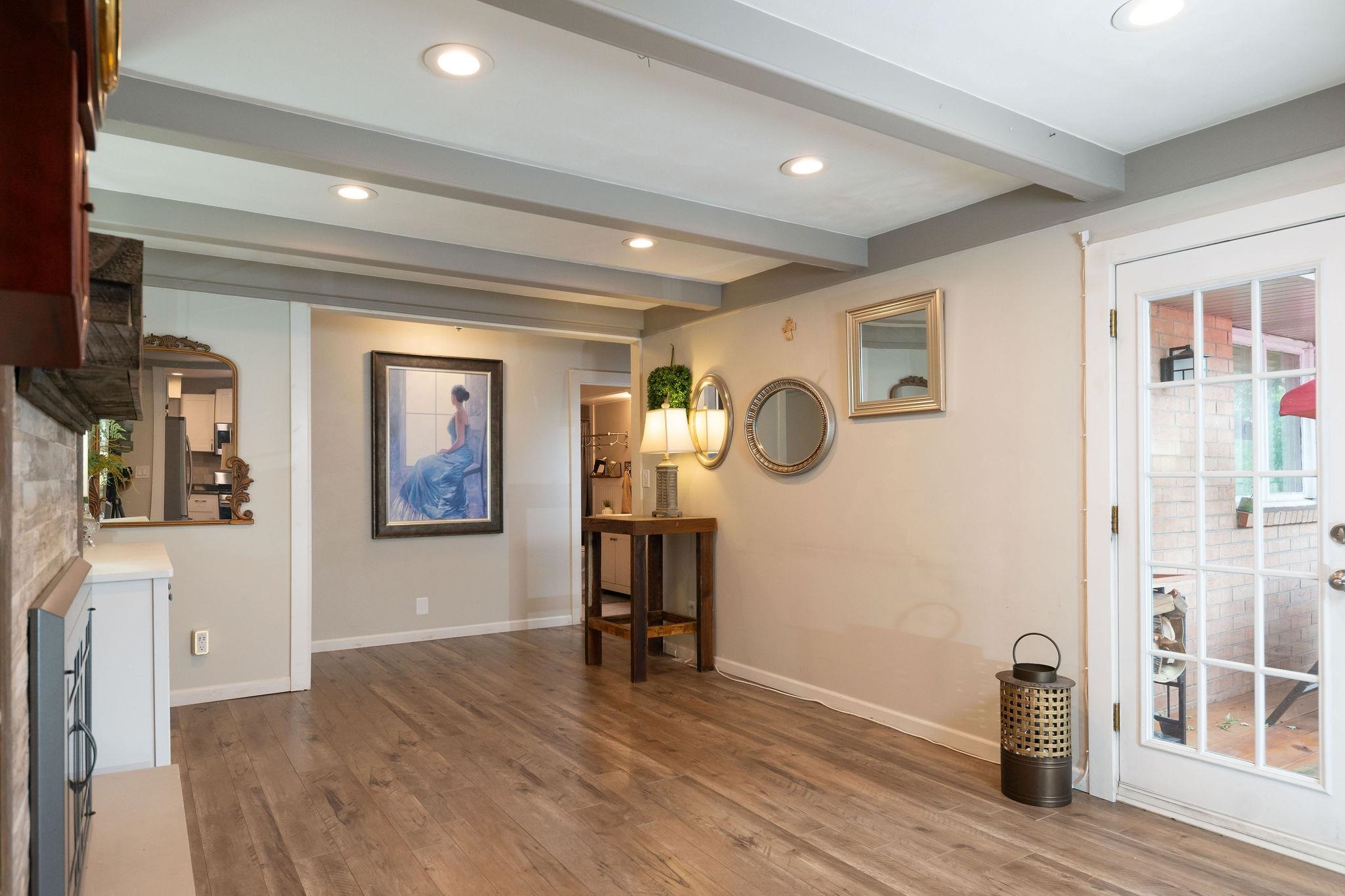 4743 Welsh Road Rockford, IL 61107 - Photo 22 of 52 a view of a room with wooden floor and furniture