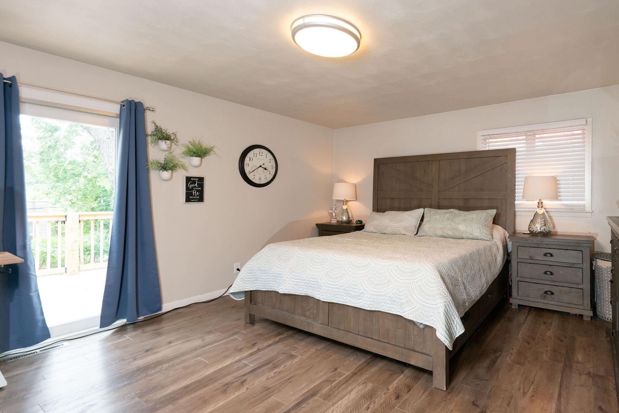 4743 Welsh Road Rockford, IL 61107 - Photo 24 of 52 a bedroom with a large bed and a window