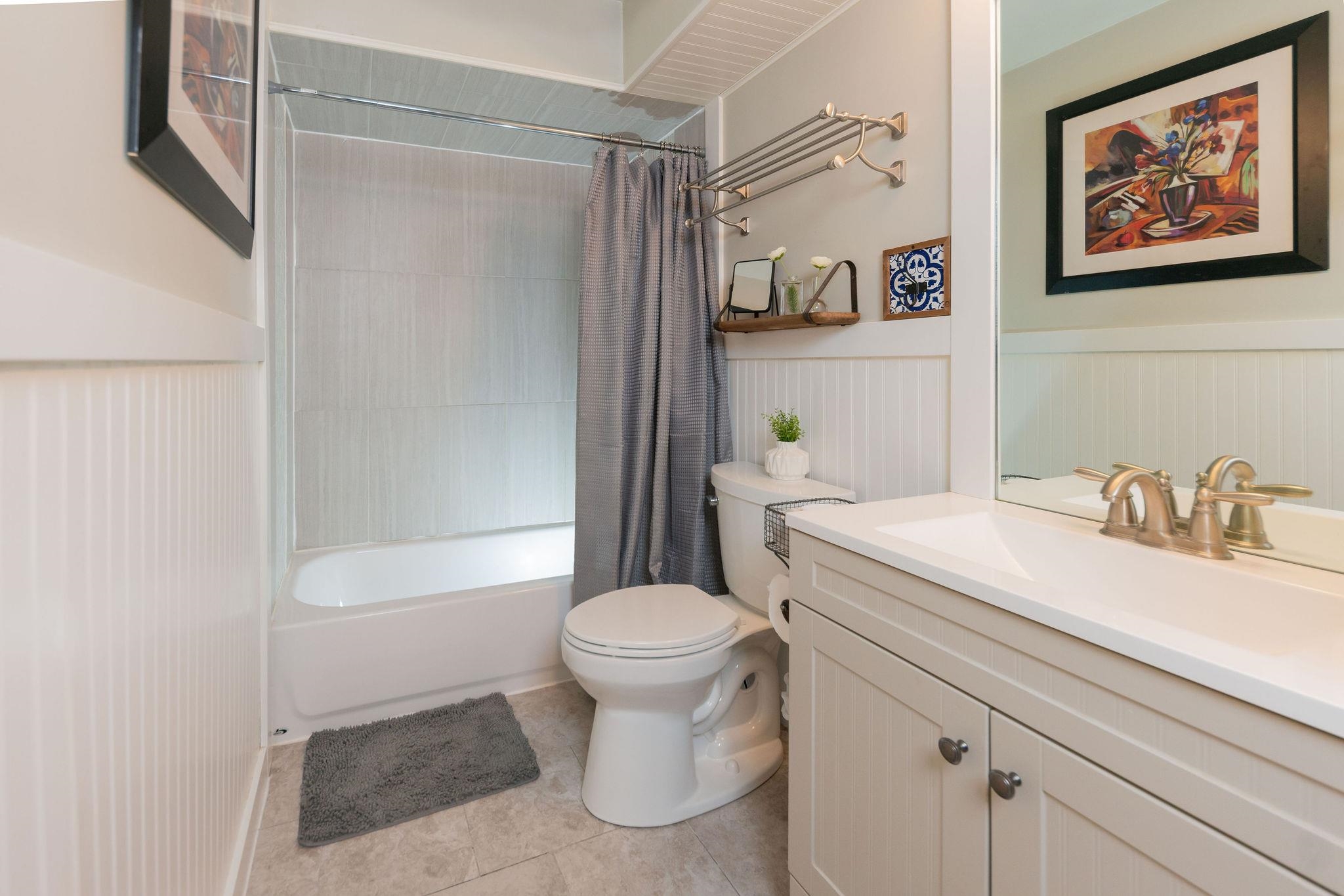 4743 Welsh Road Rockford, IL 61107 - Photo 31 of 52 a bathroom with a sink toilet and a bathtub