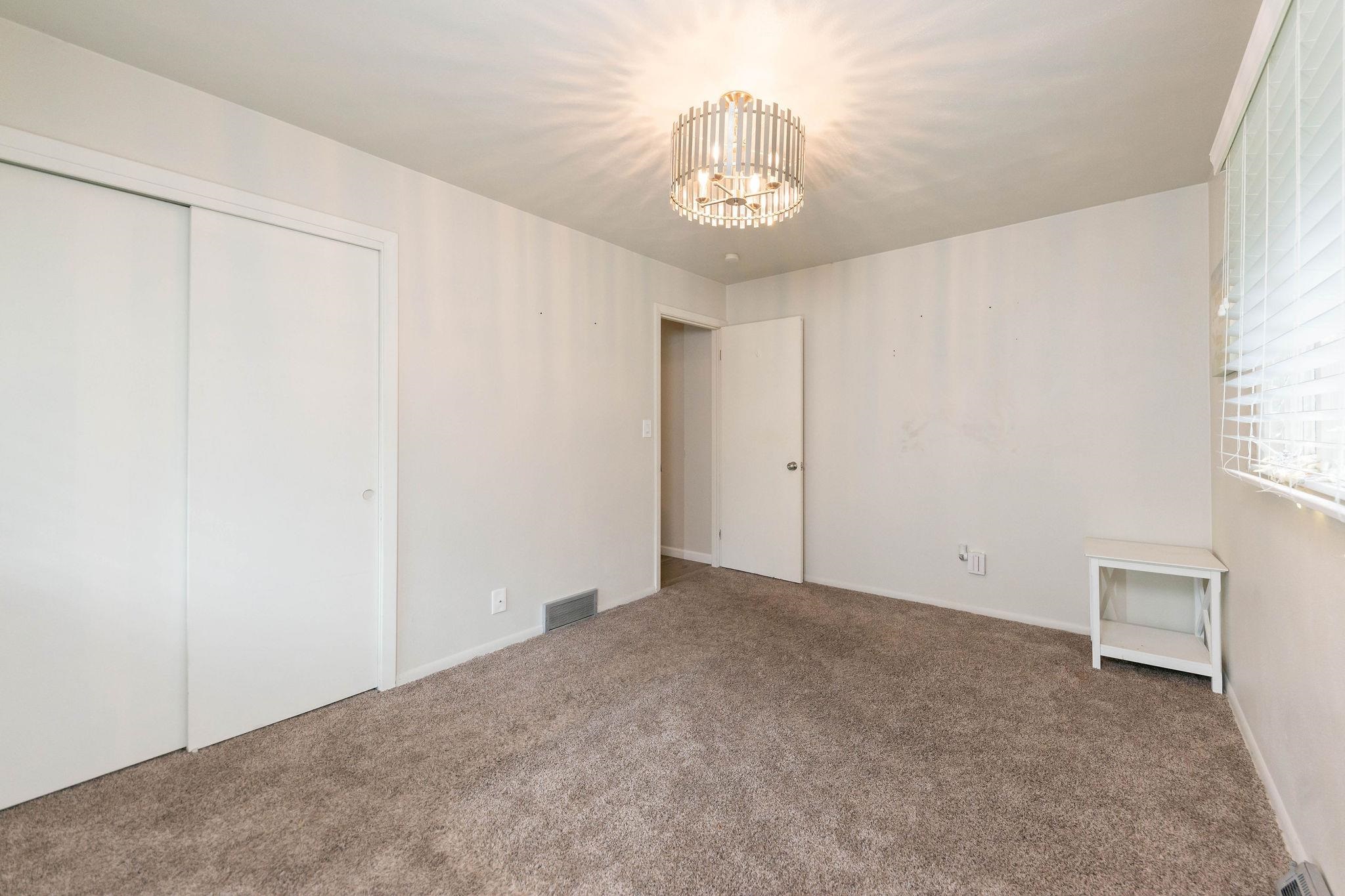 4743 Welsh Road Rockford, IL 61107 - Photo 35 of 52 a view of an empty room and chandelier fan