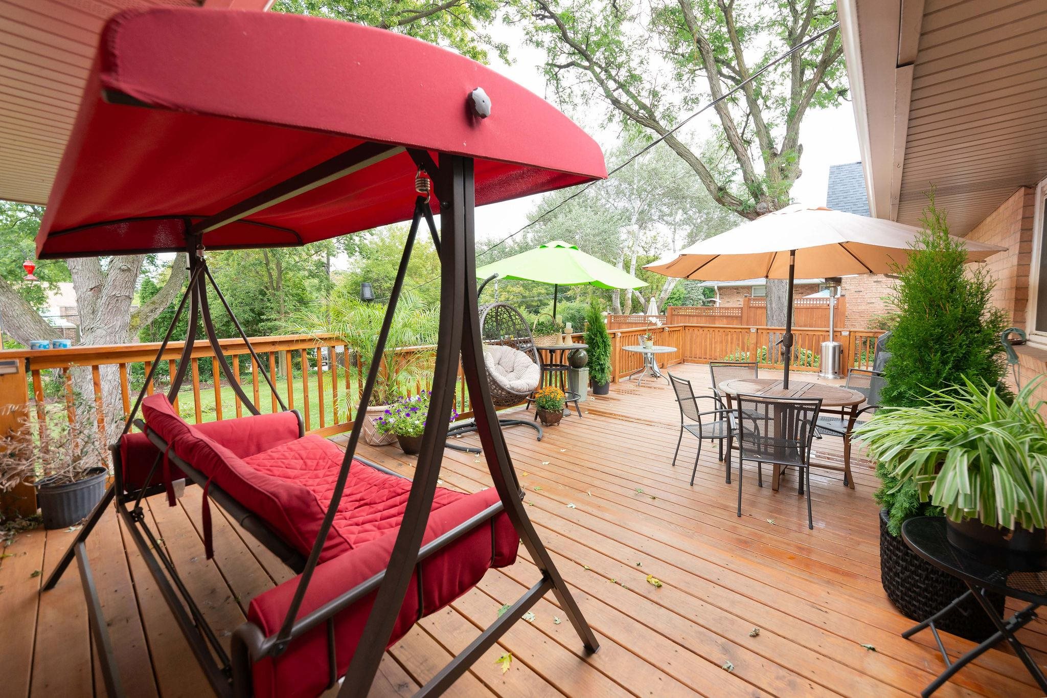 4743 Welsh Road Rockford, IL 61107 - Photo 37 of 52 a view of an outdoor sitting area with furniture and umbrella
