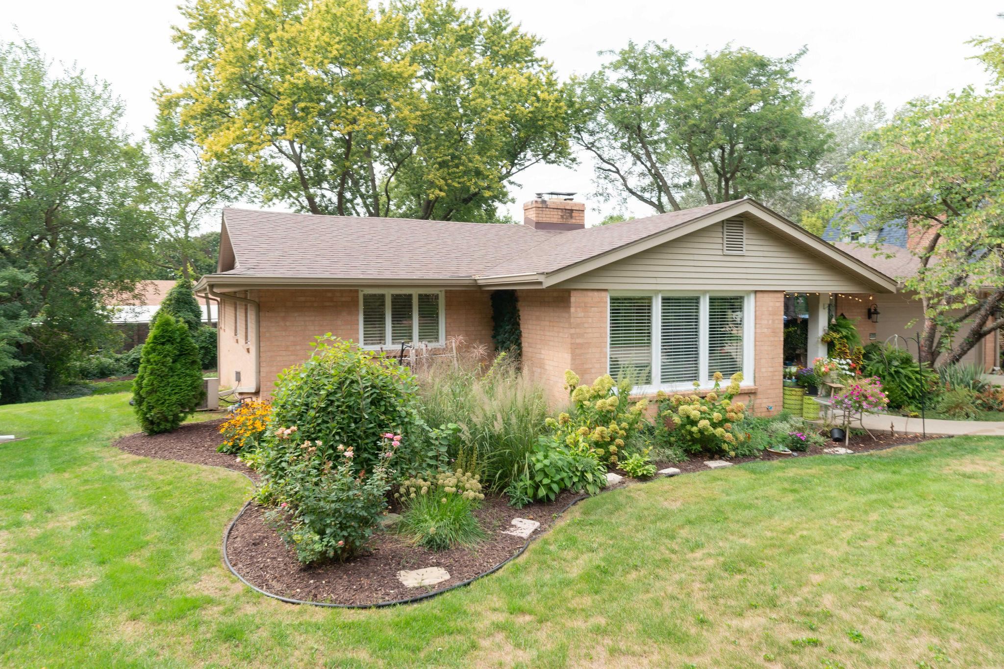 4743 Welsh Road Rockford, IL 61107 - Photo 4 of 52 a front view of a house with a yard