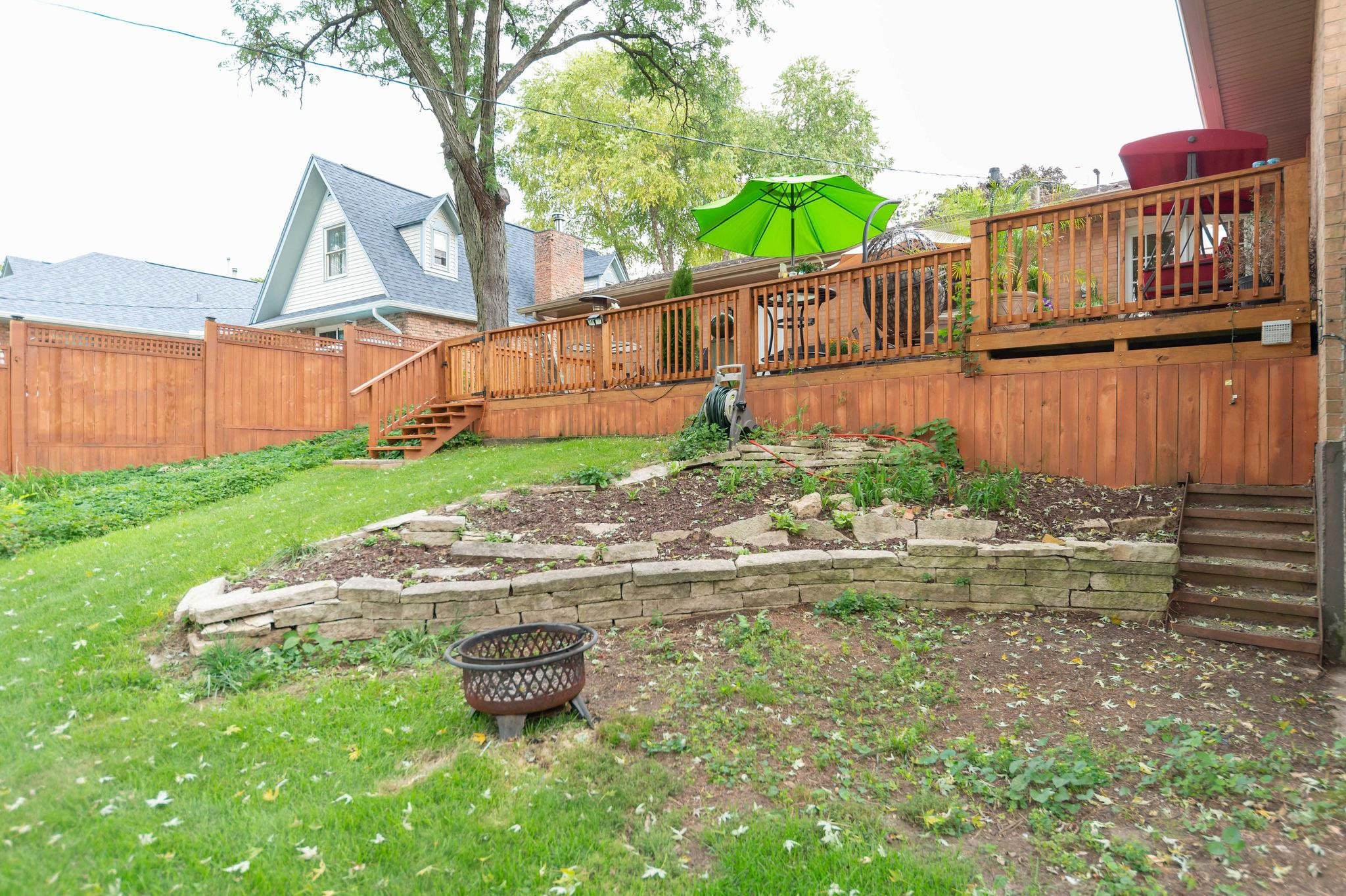 4743 Welsh Road Rockford, IL 61107 - Photo 50 of 52 a backyard of a house with a yard and outdoor seating