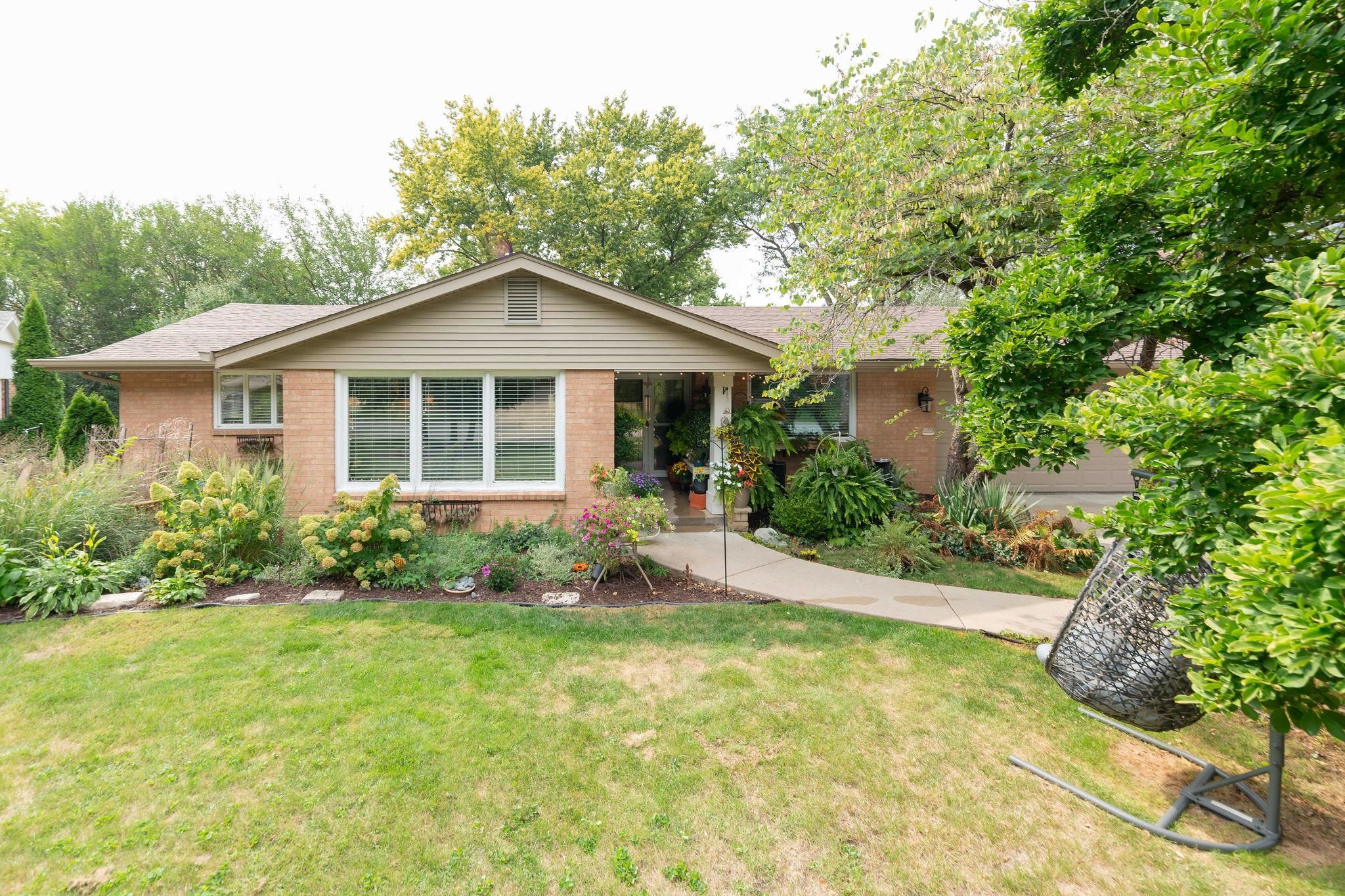 4743 Welsh Road Rockford, IL 61107 - Photo 5 of 52 a front view of a house with a yard