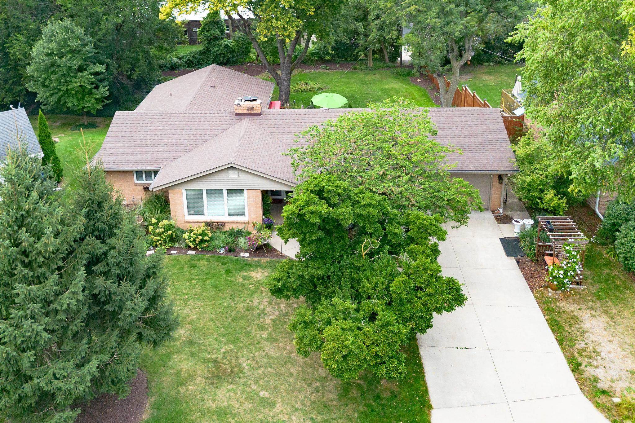 4743 Welsh Road Rockford, IL 61107 - Photo 51 of 52 a aerial view of a house with yard and green space