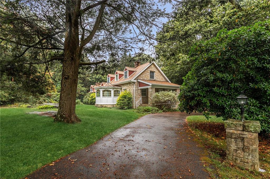 2541 Springfield Pike Connellsville, PA 15425 - Photo 12 of 49 a front view of a house with yard