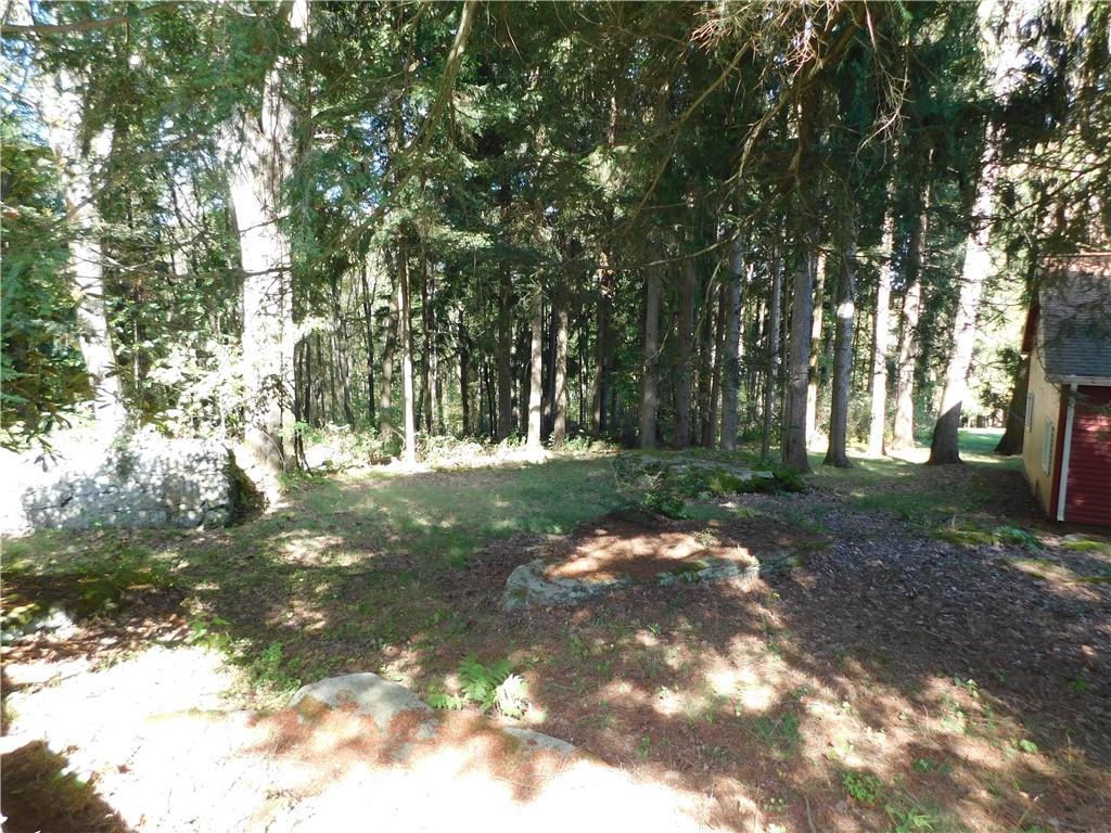 2541 Springfield Pike Connellsville, PA 15425 - Photo 19 of 49 a backyard of a house with lots of green space