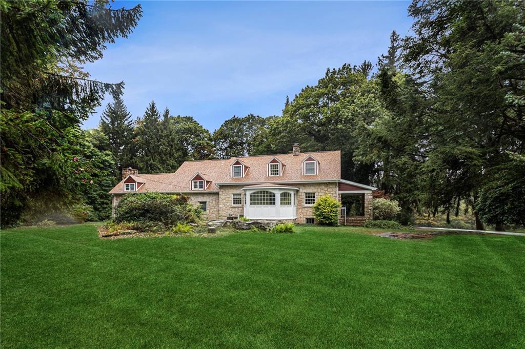 2541 Springfield Pike Connellsville, PA 15425 - Photo 2 of 49 a front view of a house with a yard