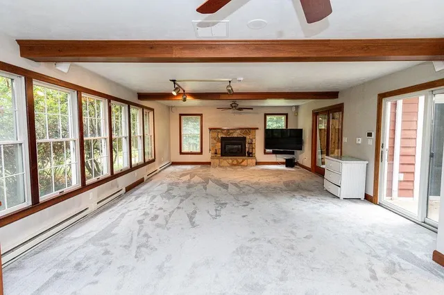 a view of a big room with large windows