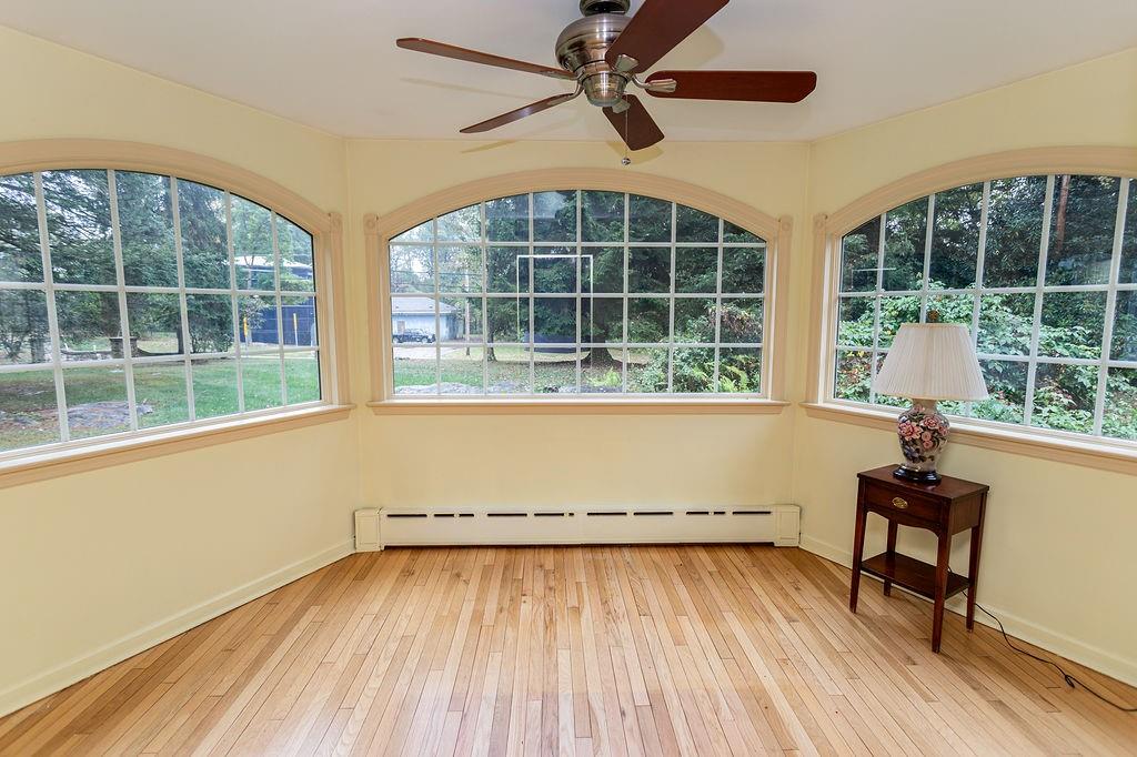 2541 Springfield Pike Connellsville, PA 15425 - Photo 31 of 49 an empty room with wooden floor and windows
