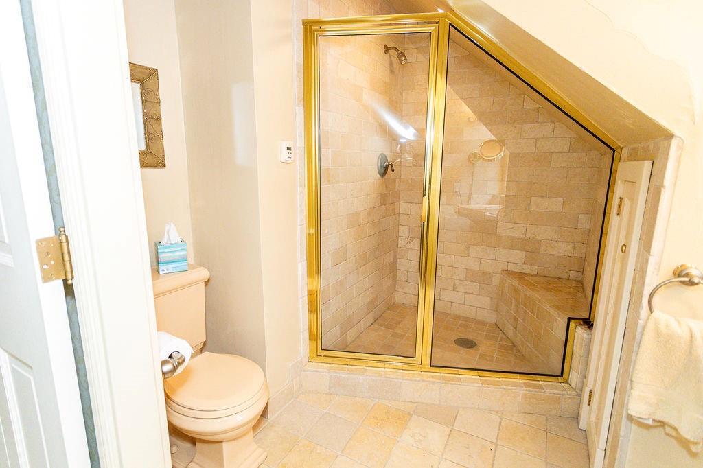 2541 Springfield Pike Connellsville, PA 15425 - Photo 36 of 49 a bathroom with a shower and a toilet