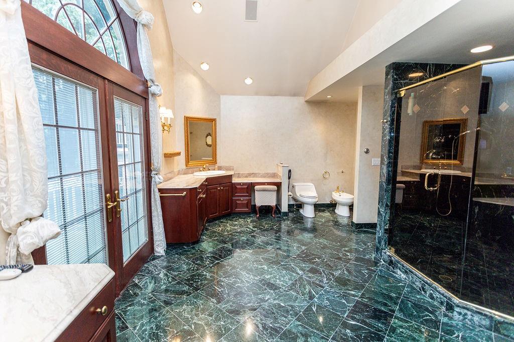 2541 Springfield Pike Connellsville, PA 15425 - Photo 37 of 49 a bathroom with a sink a toilet and shower