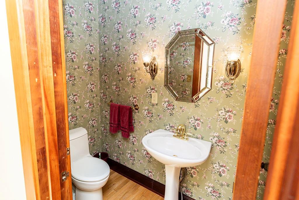 2541 Springfield Pike Connellsville, PA 15425 - Photo 41 of 49 a bathroom with a toilet sink and mirror