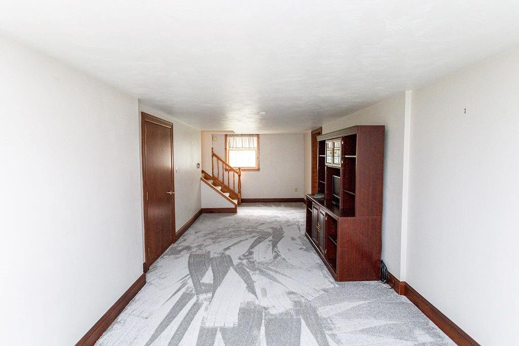 2541 Springfield Pike Connellsville, PA 15425 - Photo 42 of 49 a view of a kitchen with refrigerator and a stove