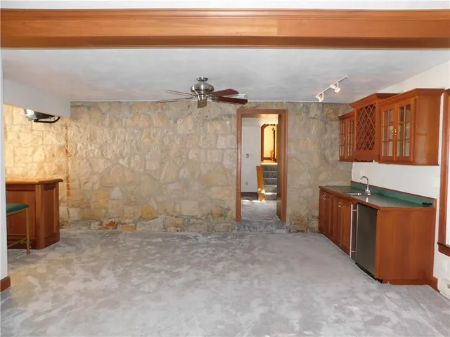 a room with furniture and window