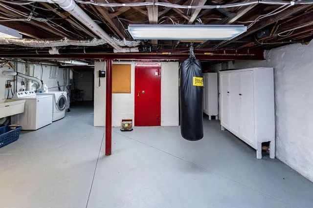 a view of an empty room with windows