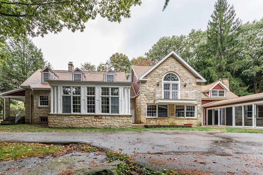 2541 Springfield Pike Connellsville, PA 15425 - Photo 8 of 49 a front view of a house with a garden