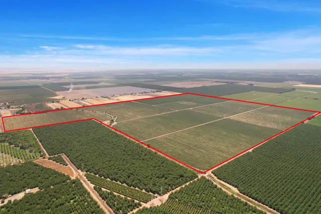 a view of an outdoor space and tennis court