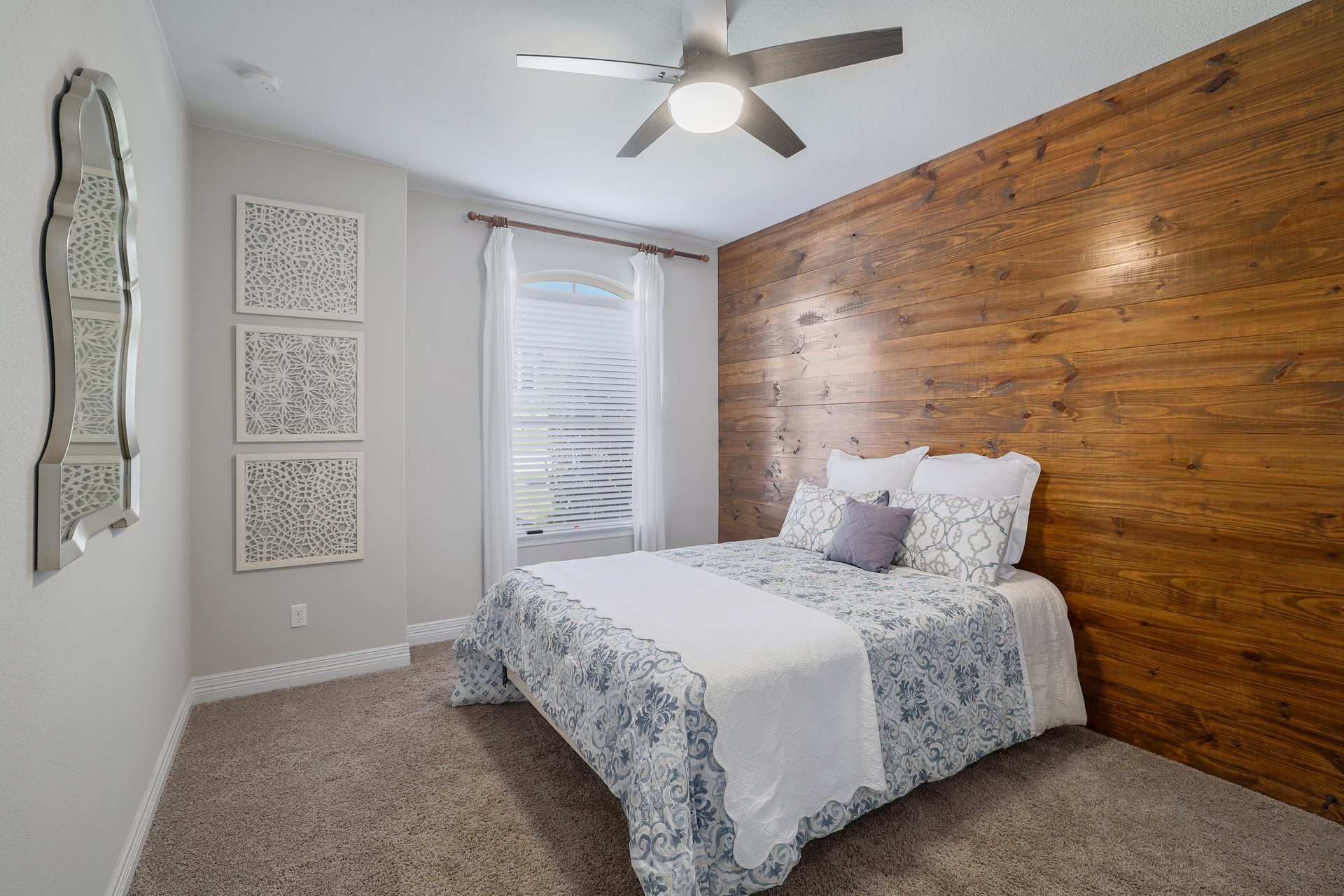 309 Rancho Sienna Loop Georgetown, TX 78628 - Photo 25 of 40 Accent wall featuring horizontal wood planks