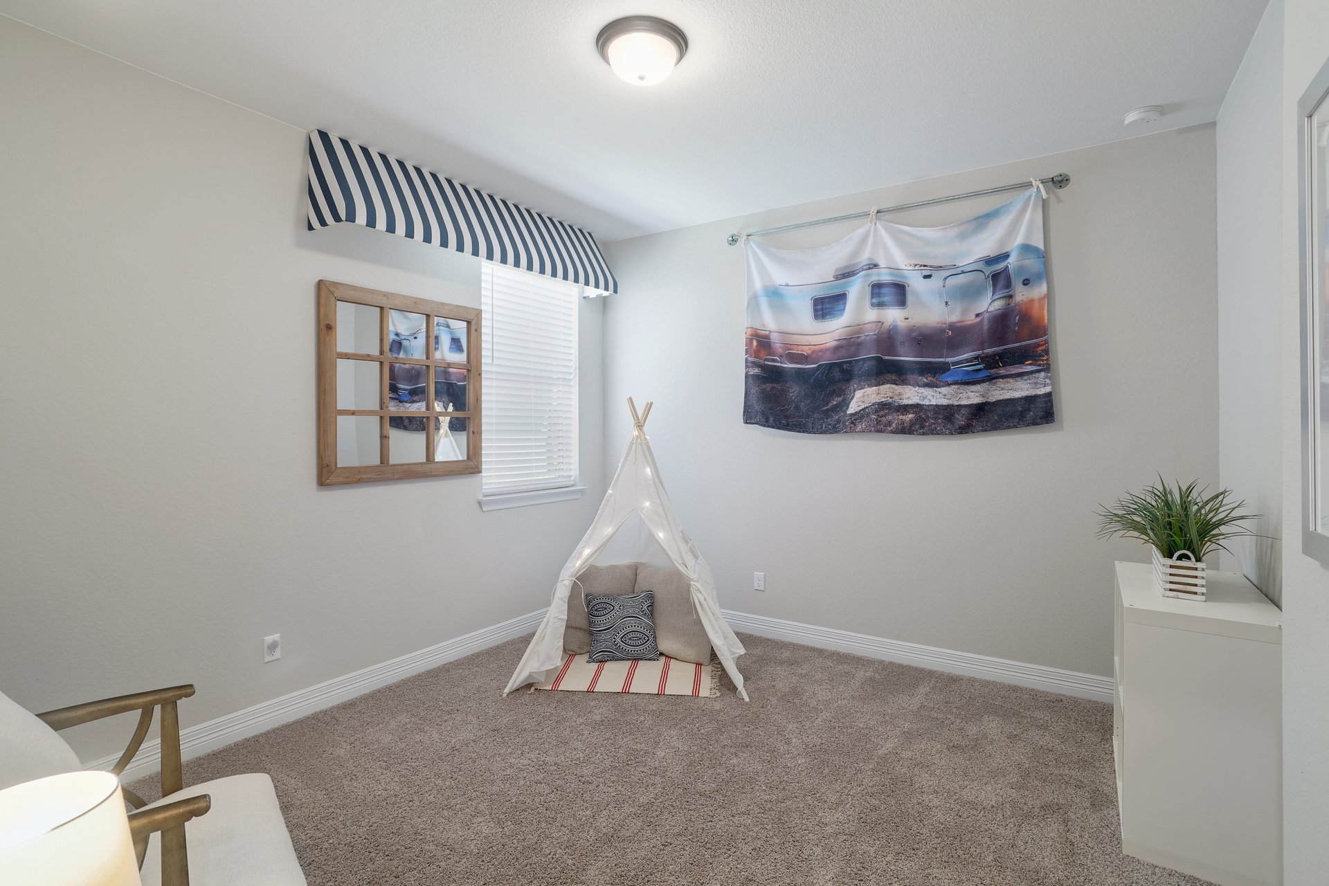 309 Rancho Sienna Loop Georgetown, TX 78628 - Photo 27 of 40 Carpeted room with a single window featuring blinds and a decorative valance