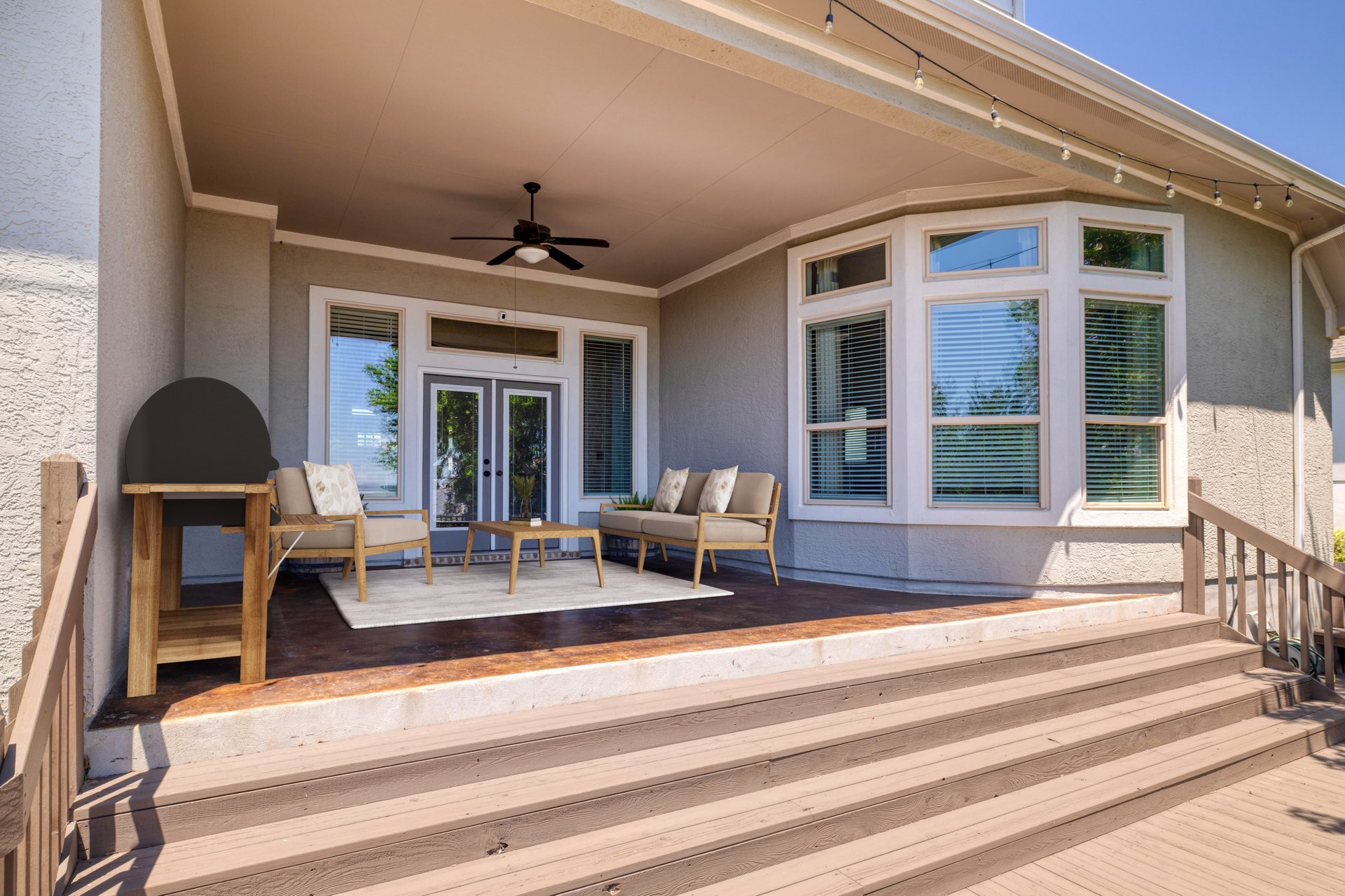 309 Rancho Sienna Loop Georgetown, TX 78628 - Photo 35 of 40 Covered patio featuring a ceiling fan, bay windows, and exterior French doors