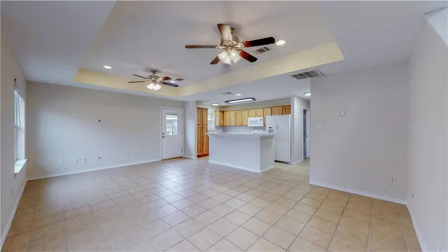 a view of an empty room and window