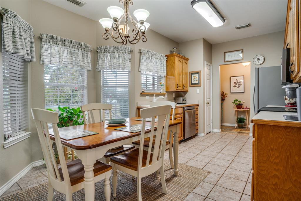 144 Red Road Howe, TX 75459 - Photo 13 of 27 a view of a dining room with furniture and chandelier