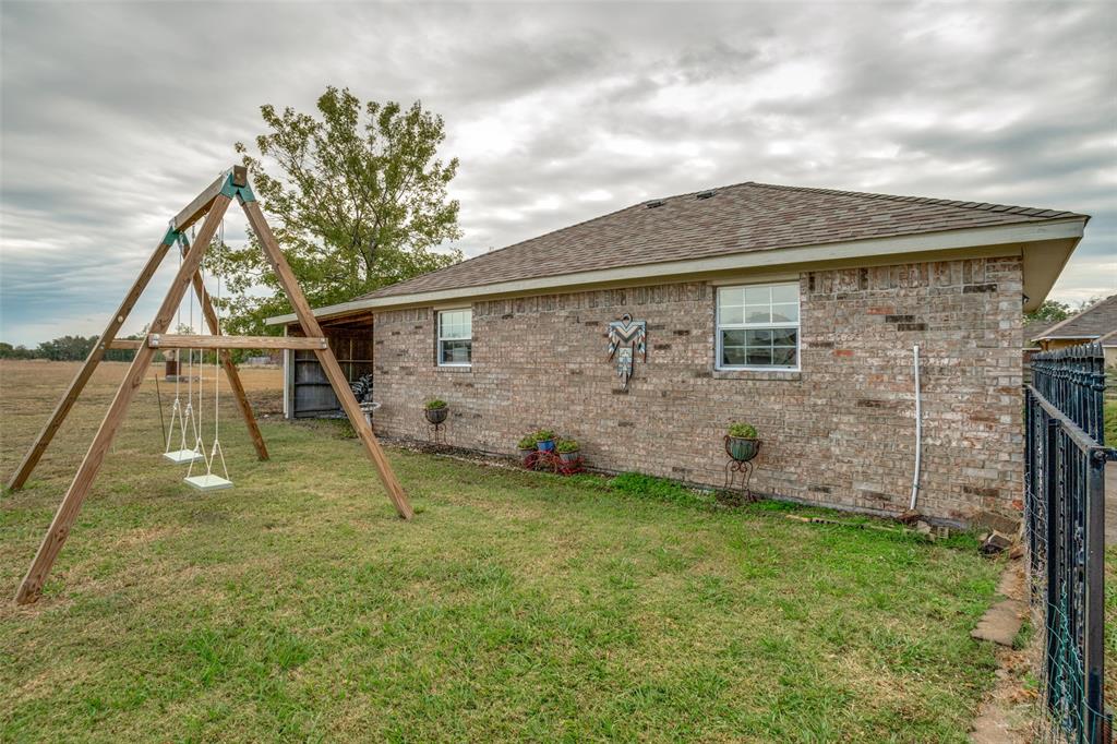 144 Red Road Howe, TX 75459 - Photo 16 of 27 a backyard of a house with lots of green space