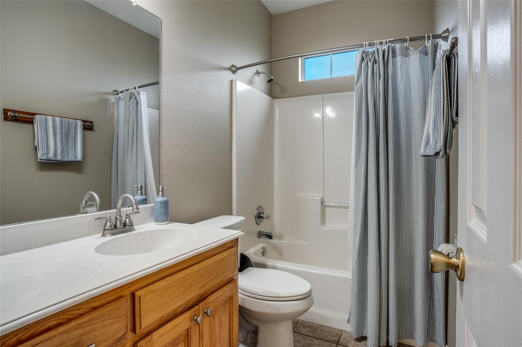 144 Red Road Howe, TX 75459 - Photo 22 of 27 a bathroom with a sink toilet and shower