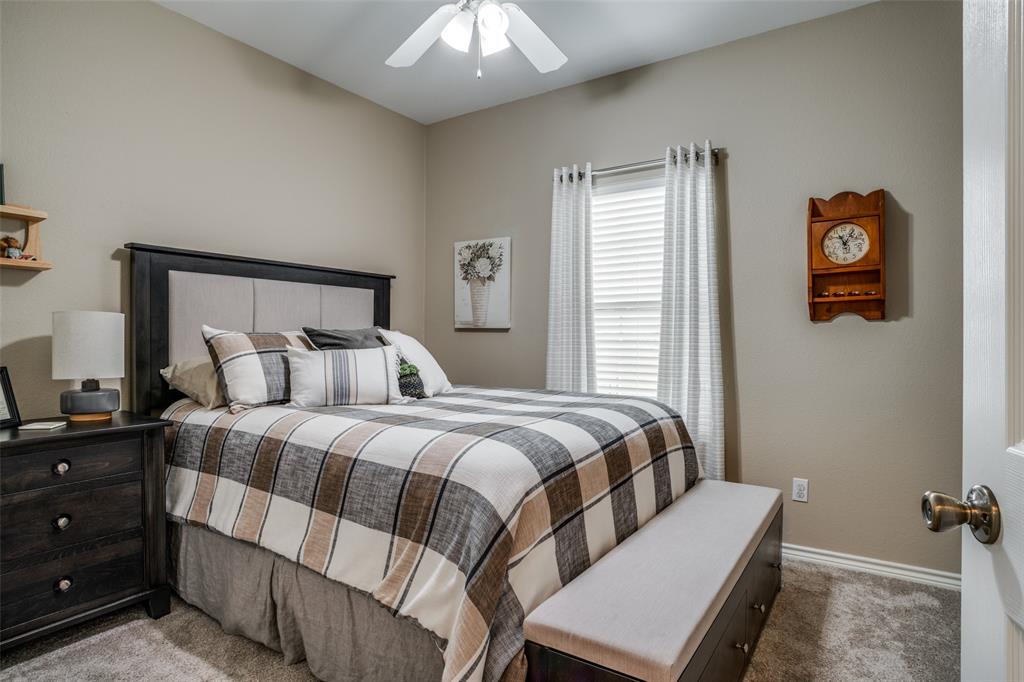 144 Red Road Howe, TX 75459 - Photo 25 of 27 a bedroom with a bed and a window