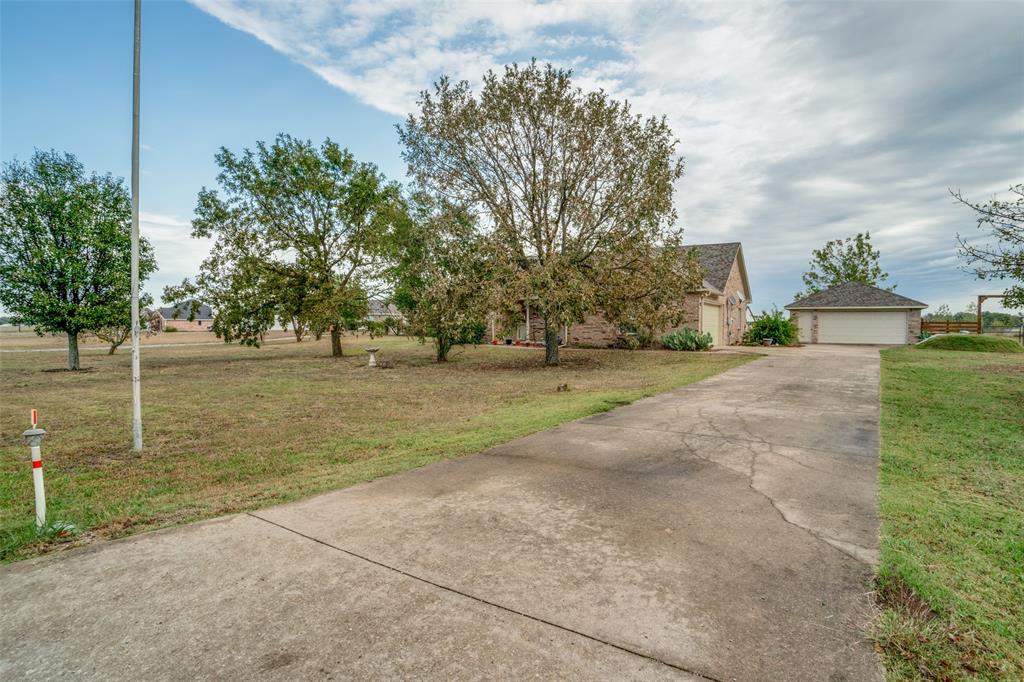 144 Red Road Howe, TX 75459 - Photo 5 of 27 a view of yard with green space