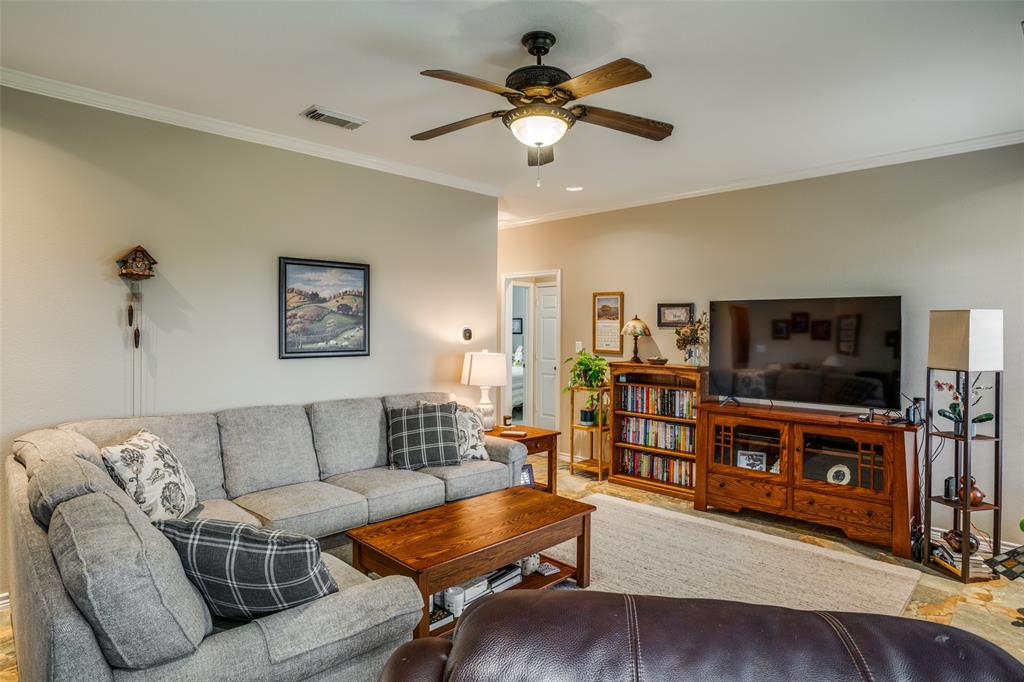 144 Red Road Howe, TX 75459 - Photo 10 of 27 a living room with furniture and a flat screen tv