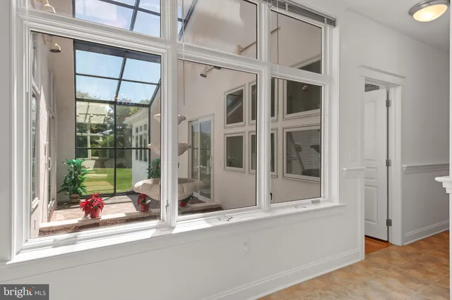 a view of a balcony with wooden floor